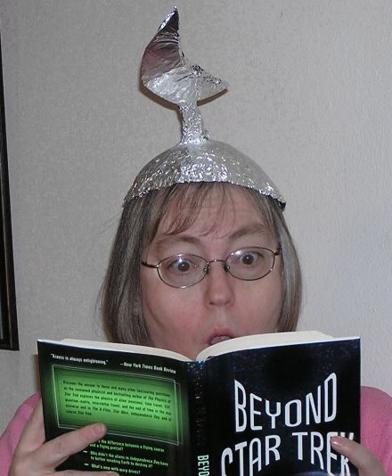 Assistant Editor Cheryl Haimann in tin foil hat.
