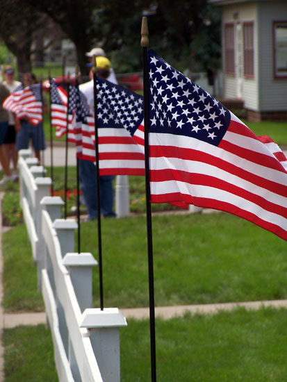Flags line the birthplace of John Wayne